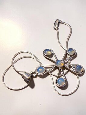 An 18" SS Chain Holding Six Opalites on A Pendant Measuring 2 1/2" x 2"